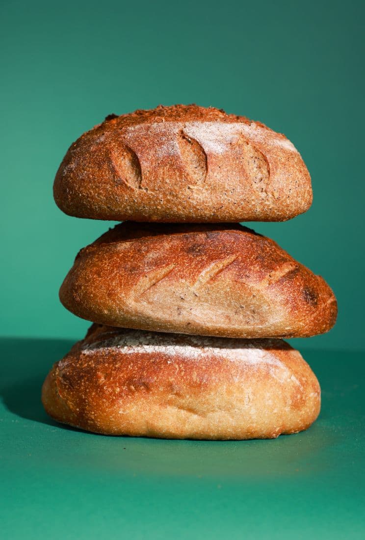 A hand-shaped sourdough loaf